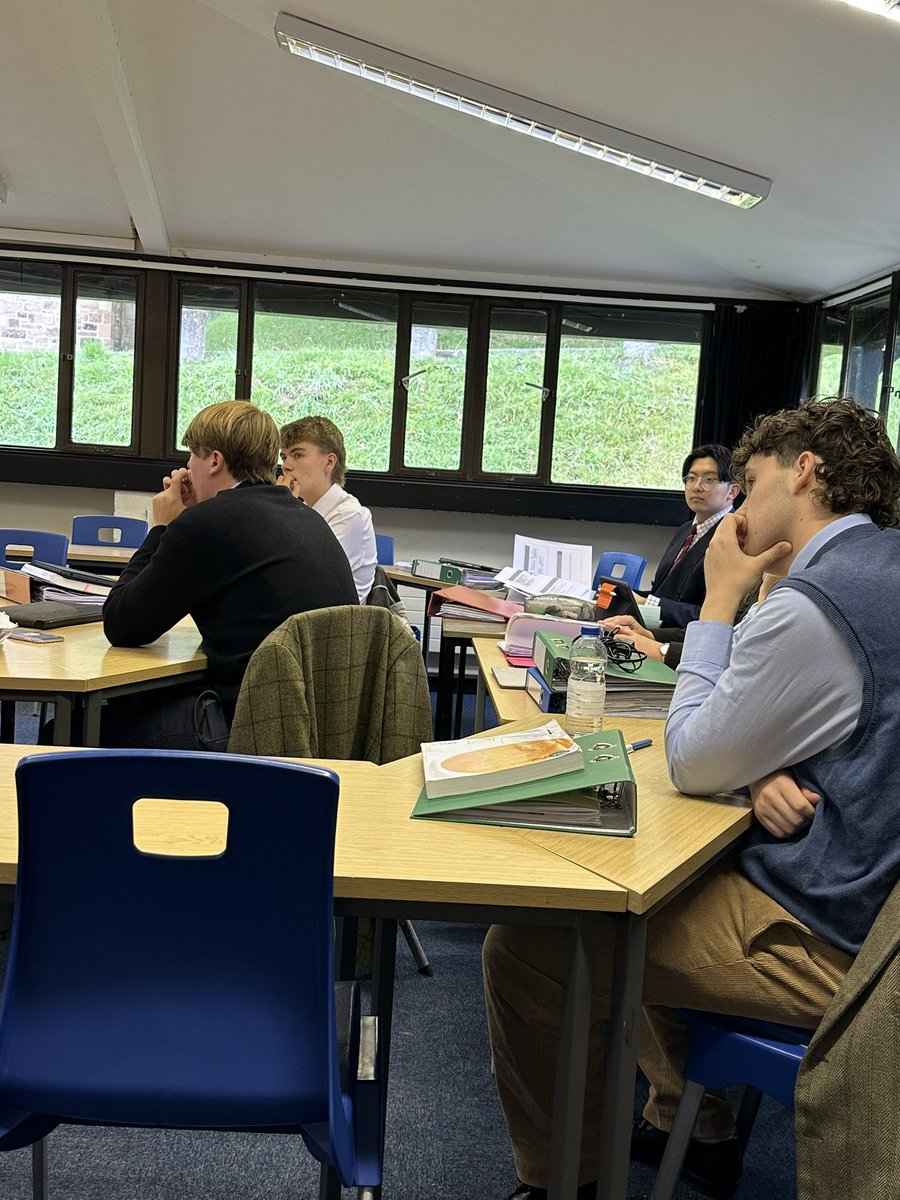 AmpColl_GovPol's tweet photo. Benedictine scholarship is about community in the classroom. Here is some collaborative work in Mr Strange’s Year 13 lesson- a recap task “taught” by Crispin to his peers! https://t.co/AN2XkG0AGc