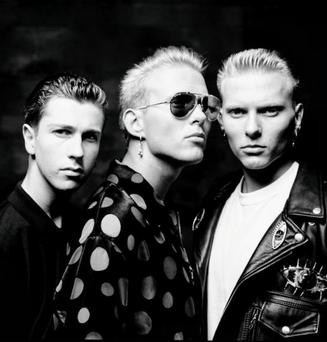 Bros photo by John Stoddart 

There's a cat among the pigeons
There's a pain in her chest
While the cat's among the pigeons
    there'll be no rest.

While the cat's among the pigeons
    he'll take the best.

#80sBritishPop #MattGoss #LukeGoss #CraigLogan #Bros