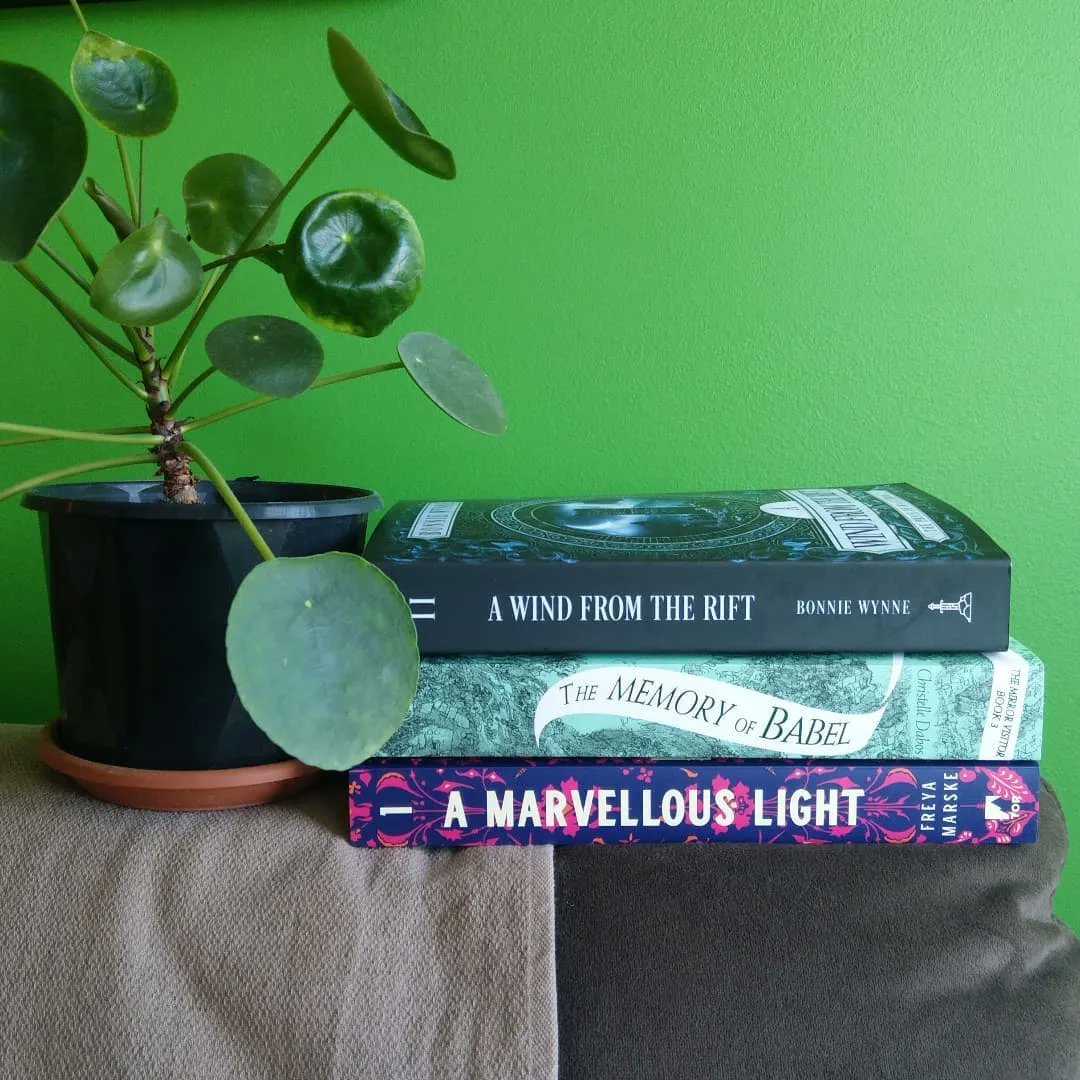 talempress's tweet photo. It's Friday! And you know what that means... Time to peruse the TBR pile for a weekend read 😌 We love the lineup in this stack from where.the.books.go on Insta, featuring A WIND FROM THE RIFT, the second volume of @itsbonniewynne's epic quintet 💚 https://t.co/Gle5wDwMqi
