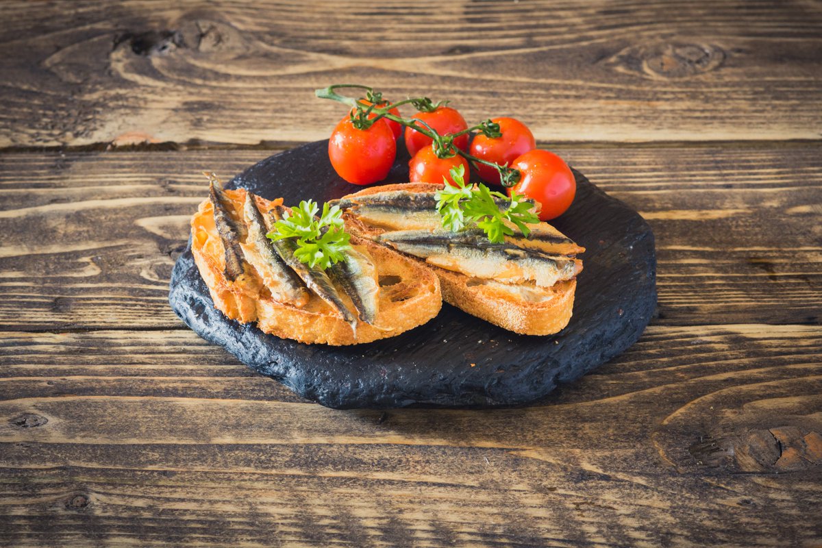 BACK IN STOCK! Hot-smoked anchovy fillets. We say: "A mighty blast of smoky, salty flavours guaranteed to electrify your tastebuds." Judge for yourself!