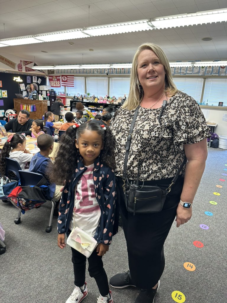 This 1st grade friend and I are twinning with our cross body bags this morning!