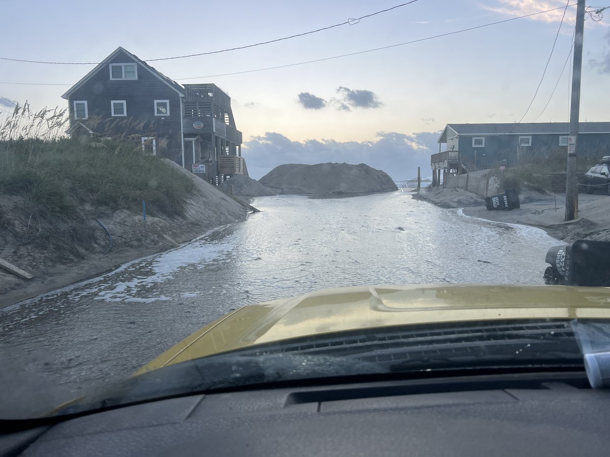 8AM UPDATE: NC12 is open and passable, with sand and some overwash on Pea Island and in Buxton and Hatteras. There is some moderate to heavy overwash on secondary roads in Rodanthe (see pictures). Crews are out clearing now. We'll update again after high tide. Drive carefully!