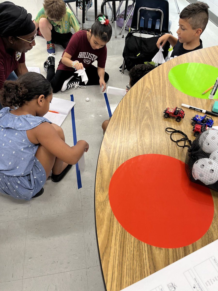 Ms.Esaw’s 2nd grade is investigating how many times it takes to move the cotton ball down the track using paper fans to create the force. <a href="/WeAreHAEST/">HAEST</a> <a href="/HillsboroughSch/">Hillsborough Schools</a> <a href="/HillsboroughSch/">Hillsborough Schools</a> <a href="/HcpsYates/">Yates Elementary School</a>