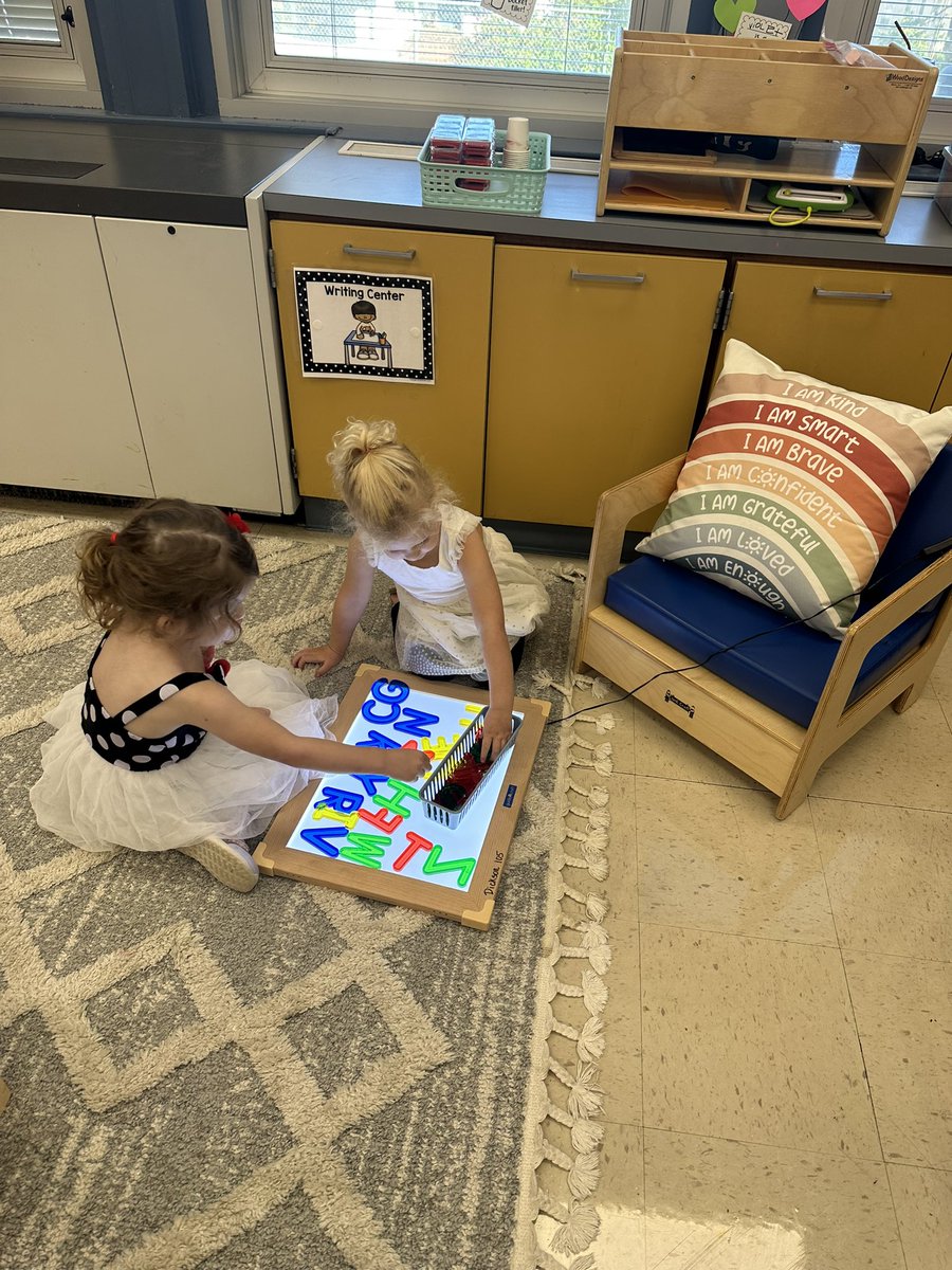 Using our new LED table to practice our letters!! #colls #sharpsharks #collsedu