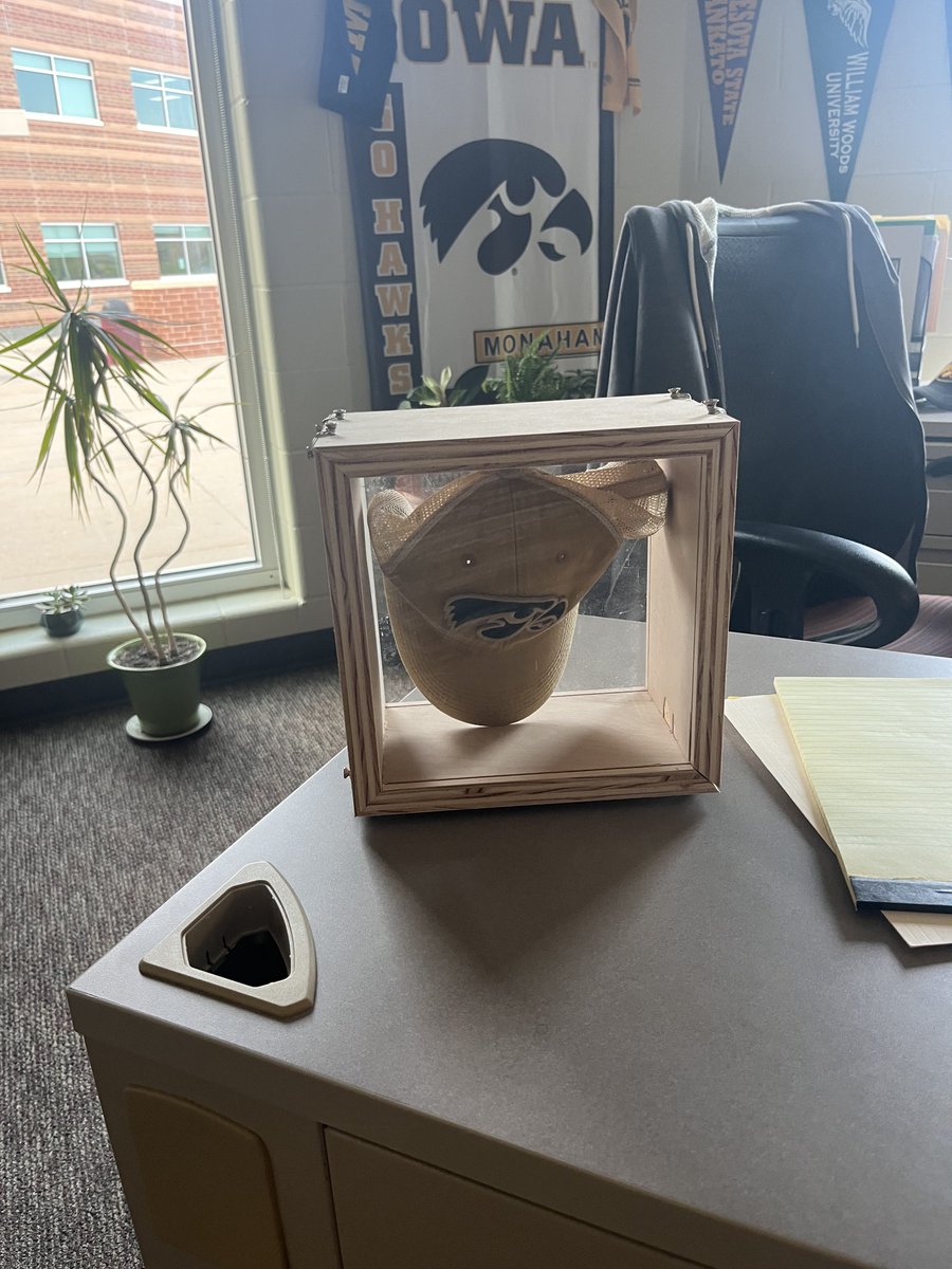 seithmonahan's tweet photo. When your shop teacher loses the Iowa/ISU bet this is how he returns the hat. #Hatcoffin. @Ankeny_HS https://t.co/fvwjOMs6Qy
