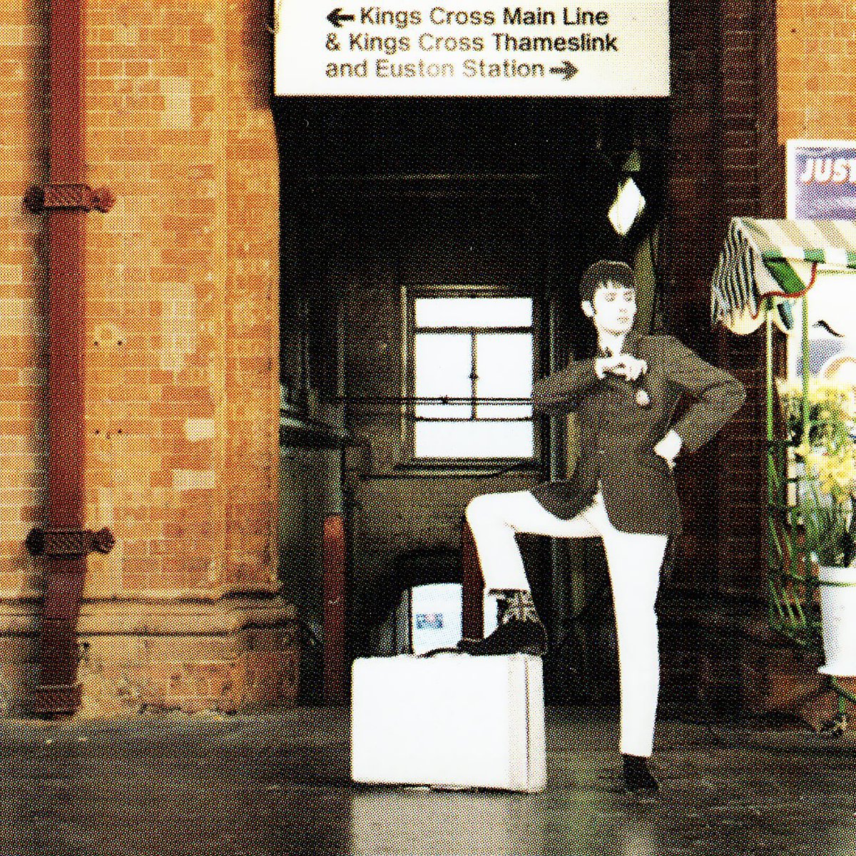 AcrylcAftrnoons's tweet image. Another Different Class artwork out-take: Russell Senior awaits the train at London St. Pancras station (1995 vs the same location in 2023). #nicesocks