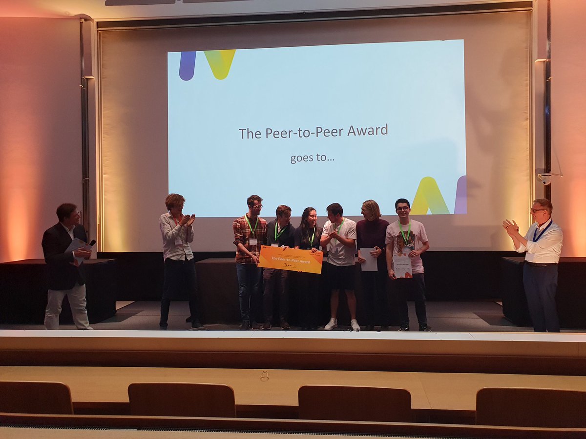EmCrayon's tweet photo. @G_Dissertori and Fabio presenting the peer-to-peer award at the #ETHWeek ! Some amazing ideas and so much energy present tonight. https://t.co/rIGX0oEKJn