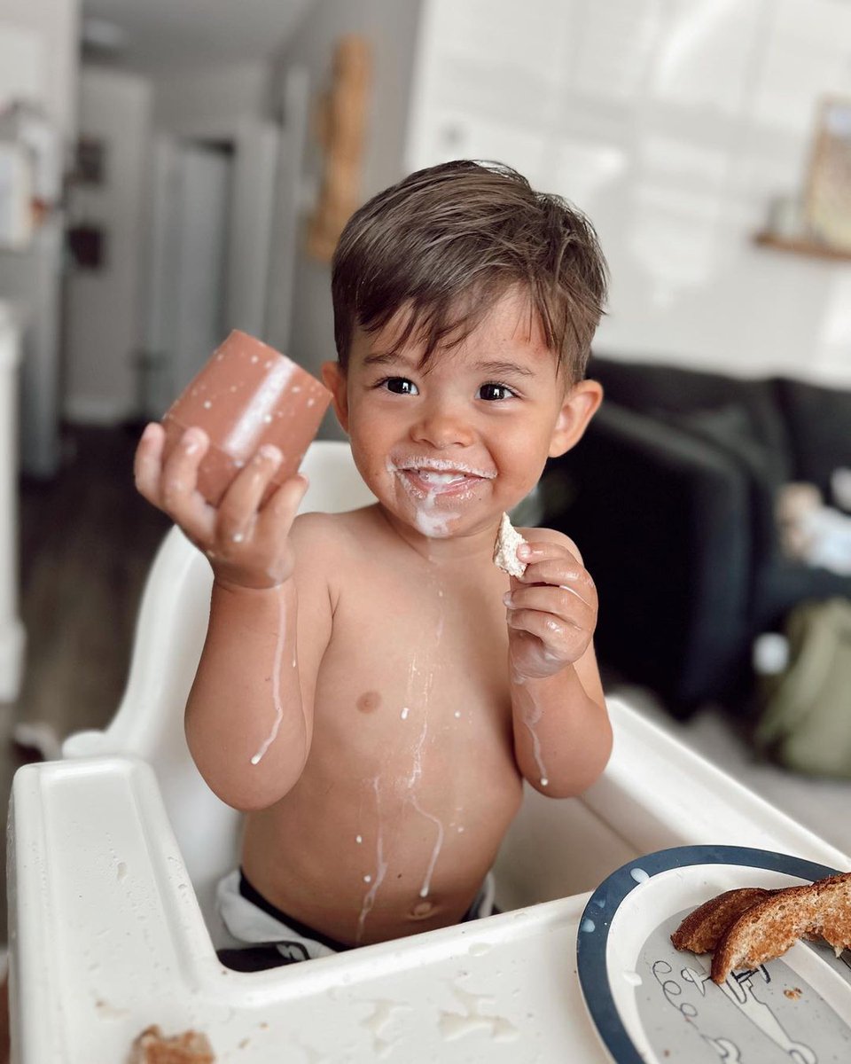 Open cup drinking is a little messy....but look at that proud ezpz smile! #ezpzfun ezpzfun.com/products/mini-…