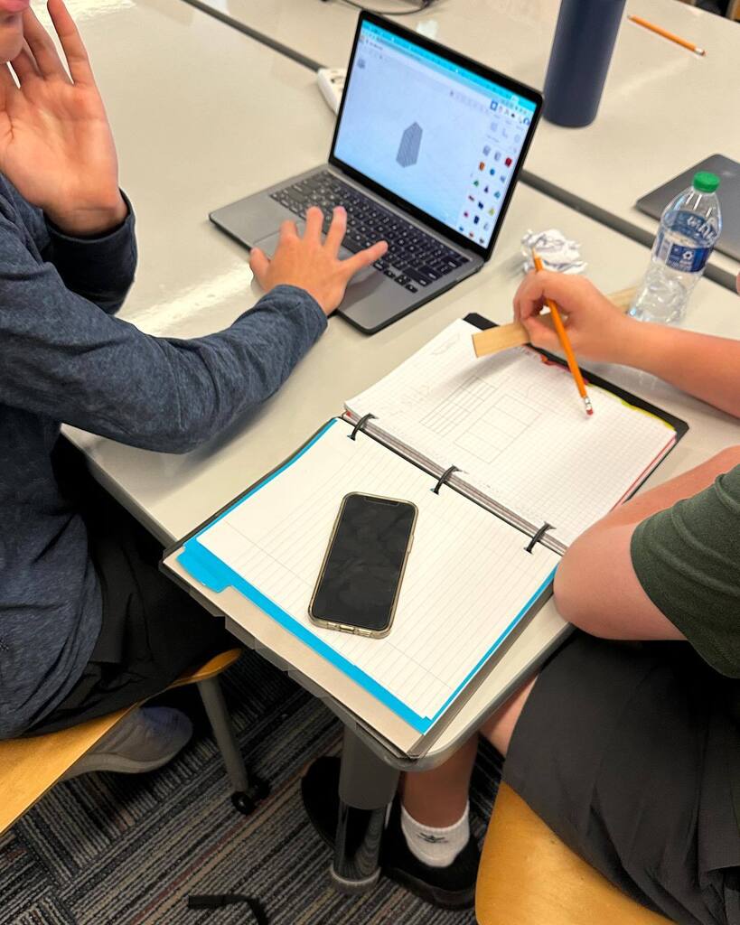 thenerdyteacher's tweet photo. Students are creating phone storage solutions based on teacher interviews. They are using the Engineering Process to design and build in our Innovation and Design class. #MakerEd #KnightsForge https://t.co/M3ROAqUhop https://t.co/WpcdpXQdFZ