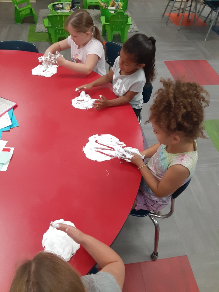 Ms. Schmeltzer’s kindergarten students at Aurora Elementary School have been hard at work writing their name and letters in shaving cream. The students have been learning the letters and their sounds through a program called Orton Gillingham.