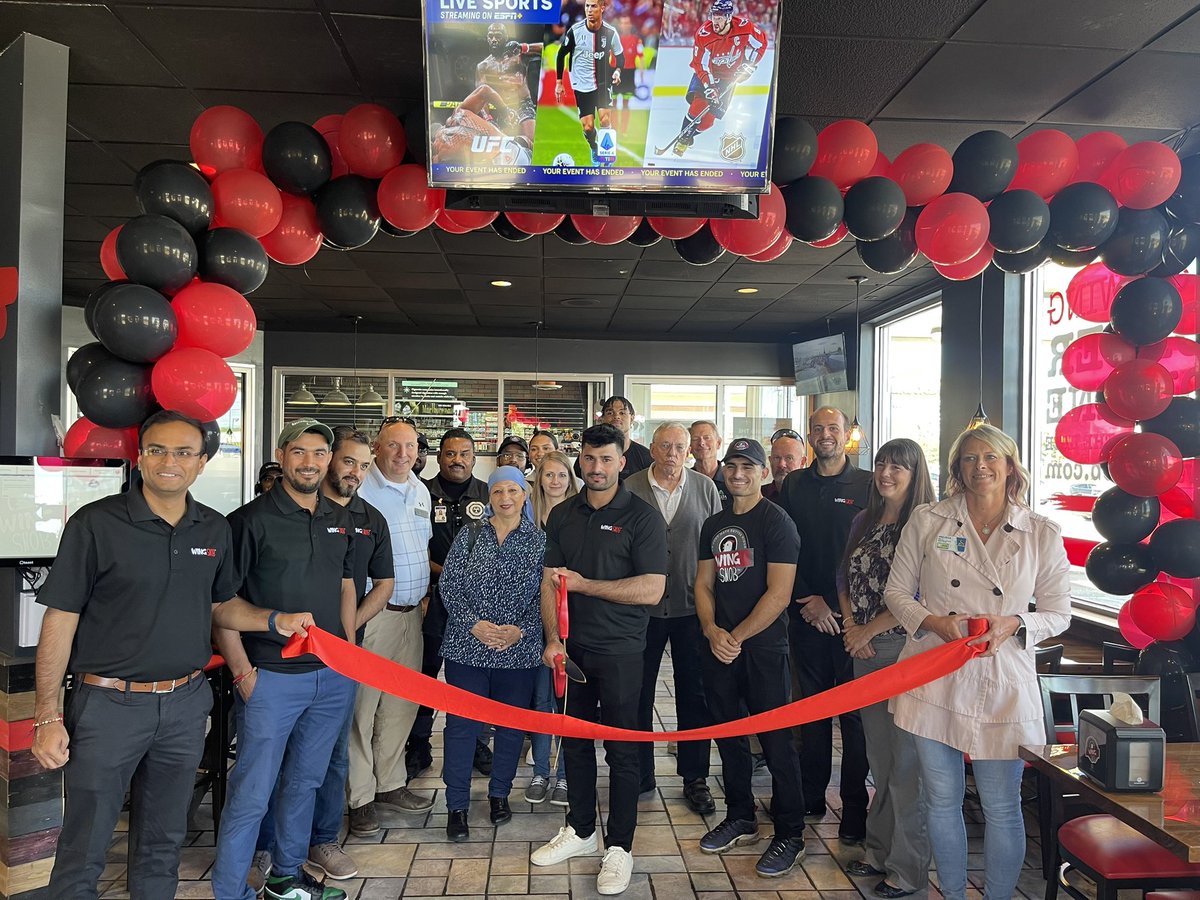 Delta Township officials and staff were excited to attend the ribbon cutting for Wing Snob - 645 Menard Drive.  Welcome to Delta Township!