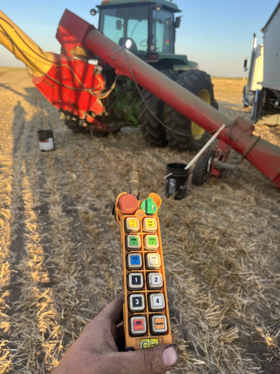 Second Fall using our <a href="/rcfarmarm/">RcFarmArm</a> remote control, on a 4450 john Deere, only have to get in the tractor to move to the next bin, controls starting the engine/stopping/RPM/PTO/HYD and can move our swing auger with same remote.