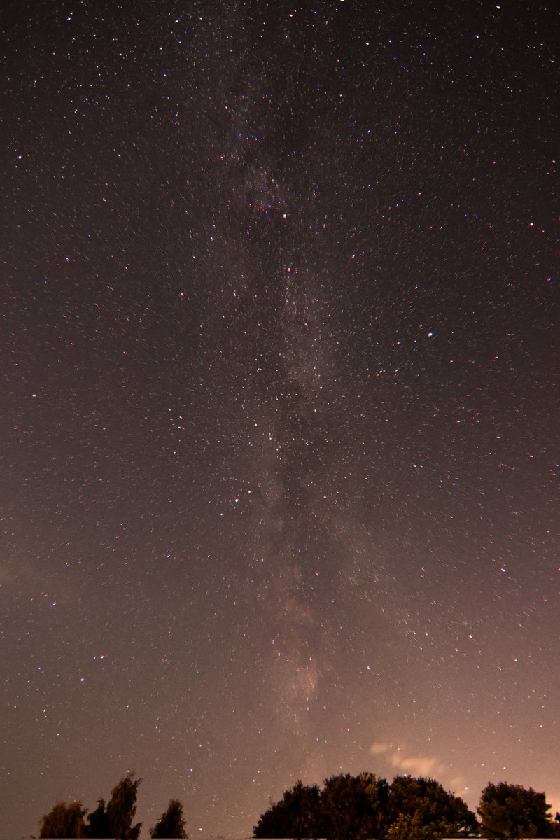 A 20 second exposure of the Milky Way from my back door just now.
