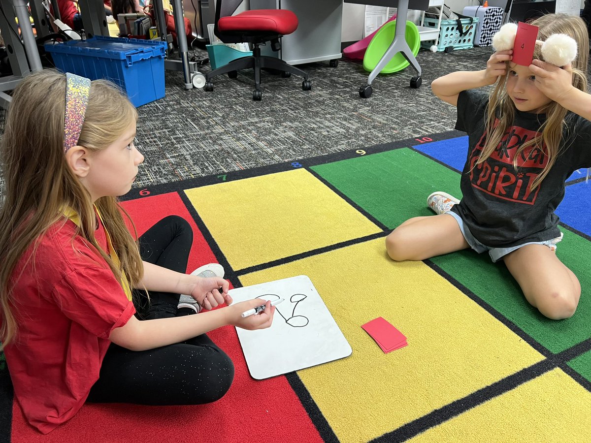 FunWithMrsPena's tweet photo. Practicing our number bonds by playing heads up with a partner. So much fun and learning going on in first grade! #BearkatBest #FunLearning @BlackBearkats https://t.co/KjhAjtcd9A
