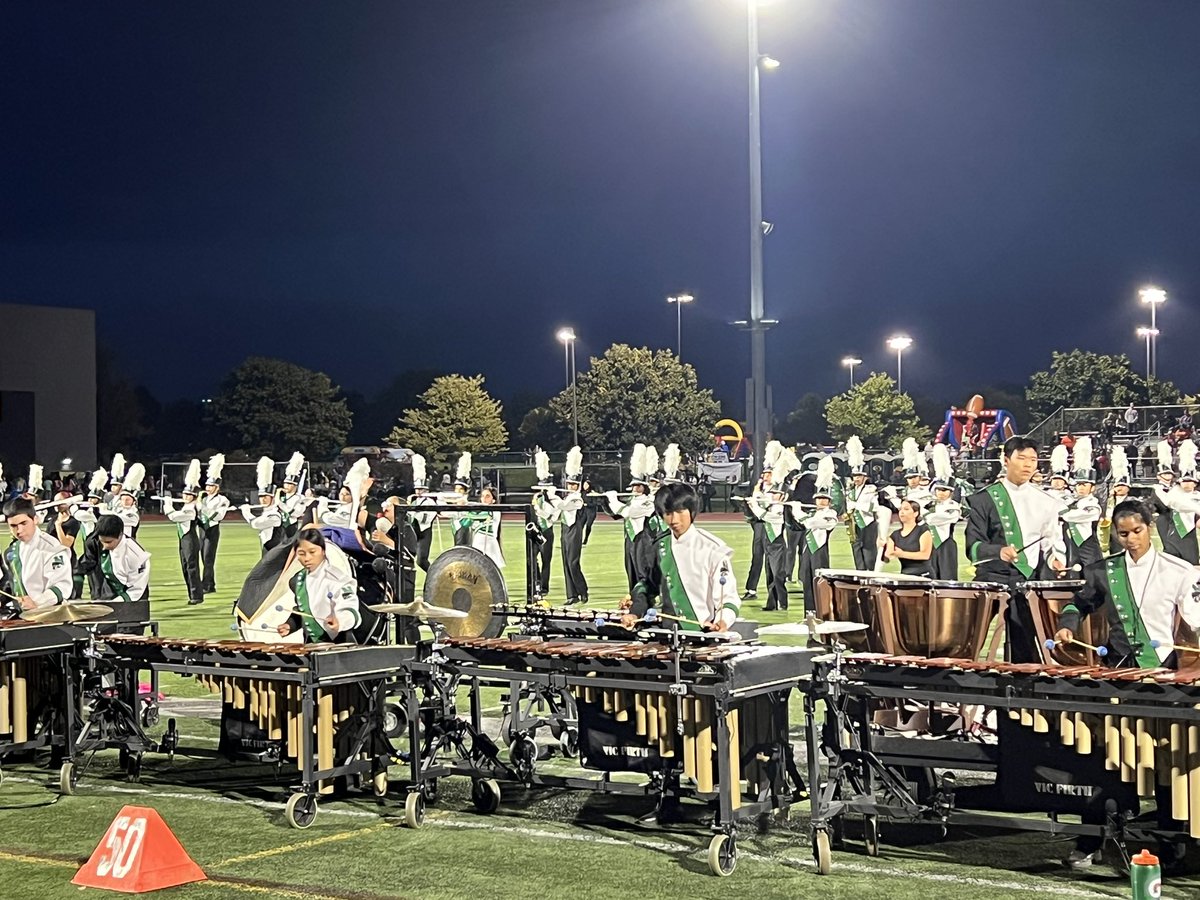 BenMainka's tweet photo. The Novi HS Marching Band is on-point tonight!! Literally dancing to techno music while holding their instruments… what an incredibly talented group of young people! #NoviPride https://t.co/1S4DGjtrPs