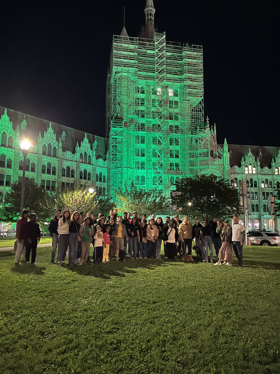 TheRNAInstitute's tweet photo. Team #RNAInstitute gathered in SUNY Systems administration building and NY state capital plaza to see it lit up in green https://t.co/sR8OmCeZ6K
