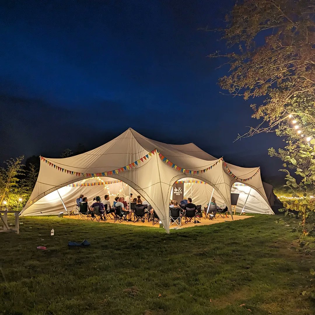 dingbatsimprov's tweet image. Last weekend was the first ever Dingbats Improv Retreat! It was a glorious weekend full of laughter with amazing people. Here's some photos from the Friday of us kicking off with a big group workshop, pizza, jam in the big top and chilling around the campfire 🔥 #DIRT23