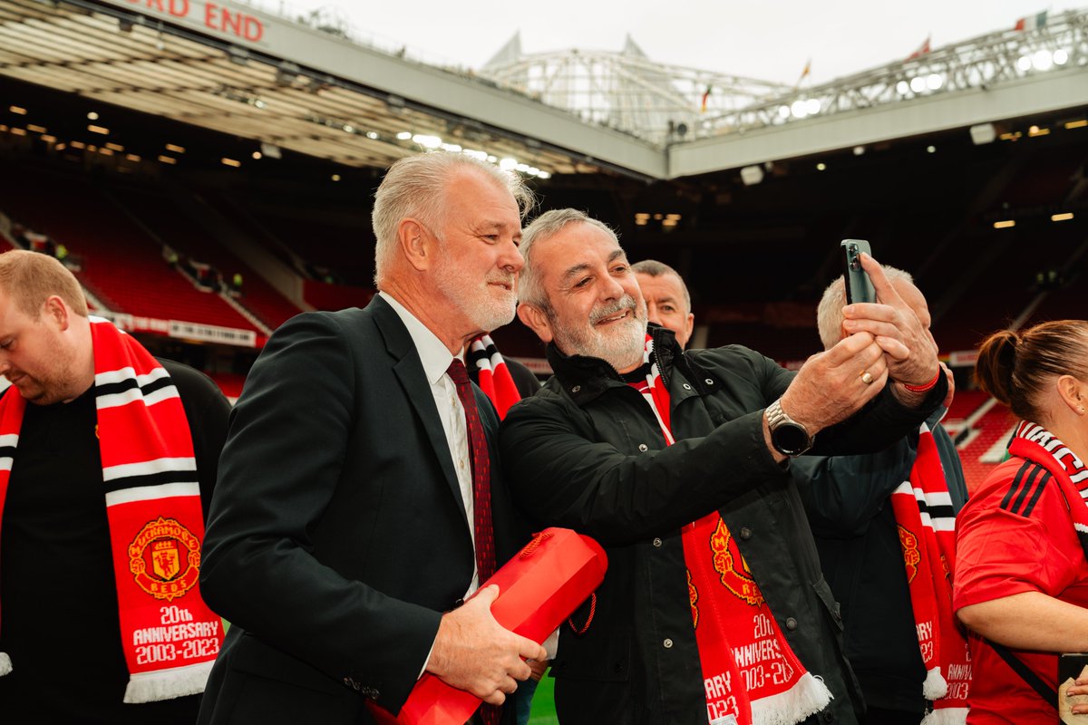 ManUtd's tweet photo. Celebrating 20 years of unwavering support! ❤️

It was great to welcome members from official United Supporters' Club, Muckamore Reds, to Old Trafford today — congratulations on your landmark and thank you for your backing! 🔴

#MUFC || #UnitedForTheFans https://t.co/3DWGCkuxfk