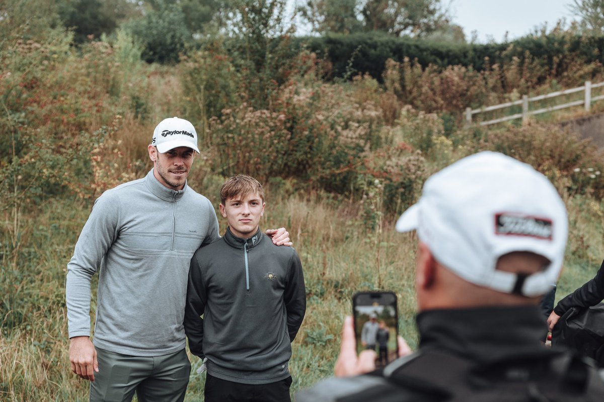 wales_golf's tweet photo. Gareth Bale 🤝 supporting the players 

@garethbale11 | @TheCelticManor https://t.co/DLXztSbgdQ