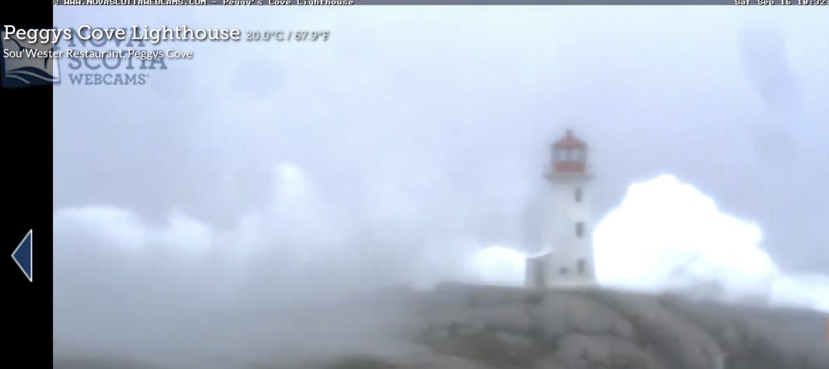 Wave just went over all the rocks a Peggy’s Cove.