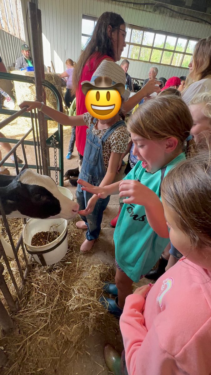MsCamMac's tweet photo. @BrettvhAAFC @AAFC_Canada Despite the look on my daughter’s face after feeling a cow’s tongue, she loved every minute of it! https://t.co/t9xQ0hBIyi