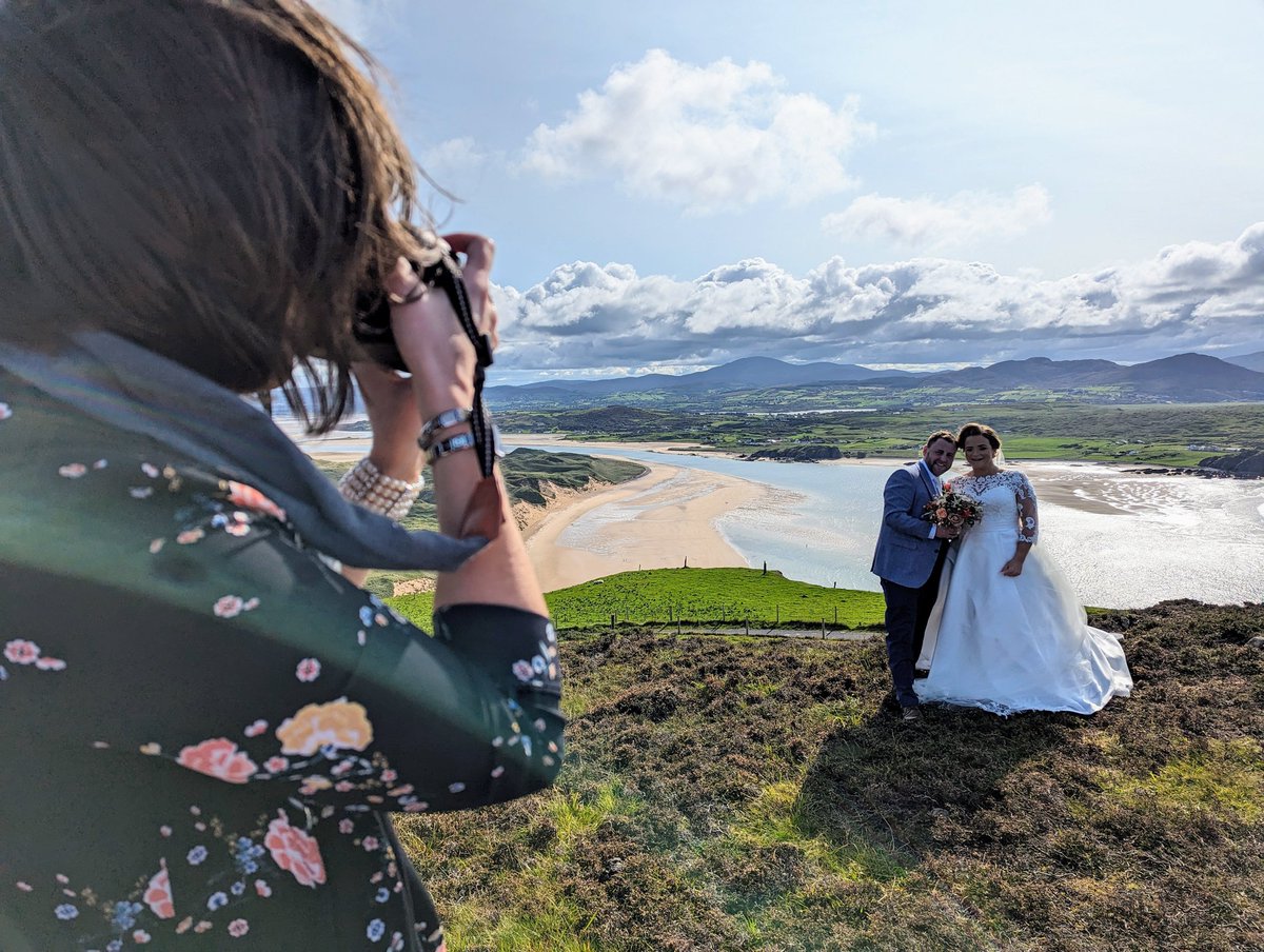 chriswpollock's tweet photo. Doing my duty as a photographers helper today. Amanda doesn't normally do weddings but as the bride is  one of her cousins she has made an exception. Hard to argue! Look at that view! #Inishowen #FiveFingerStrand  #WildAlpacaWay https://t.co/HGk8Y8HoHu
