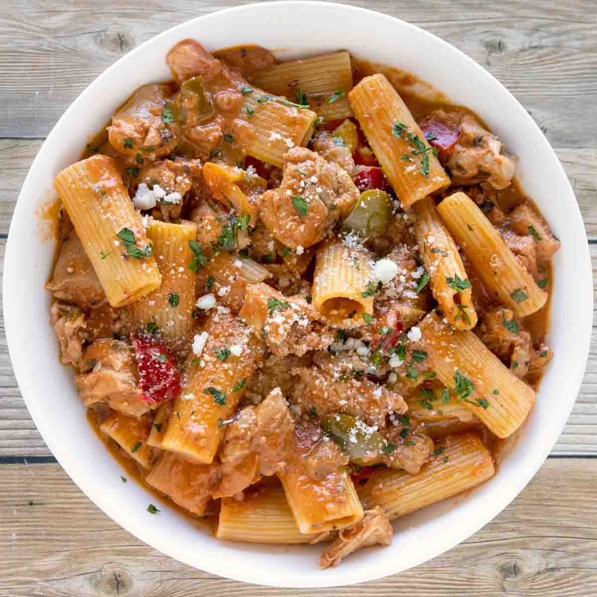 Introducing a pasta dish like no other: Chicken Riggies! 🍝 A local delicacy from Utica, New York, this creamy and spicy dish is bound to be a hit at your dinner table. #pasta #recipe #dinner #foodie Printable Recipe-> bit.ly/ACDchixriggies