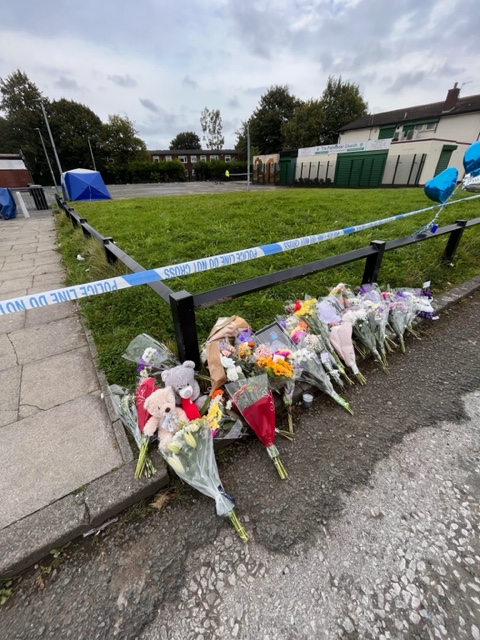 Tributes left at the scene in Harpurhey, Manchester, where a 14-year-old boy, named locally Nathaniel Shani, was stabbed to death.