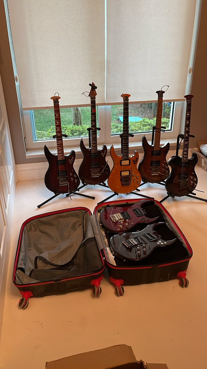 Getting ready for the #GuitarSummit. Did you know that you can fit four Shark Guitars into a regular suitcase?