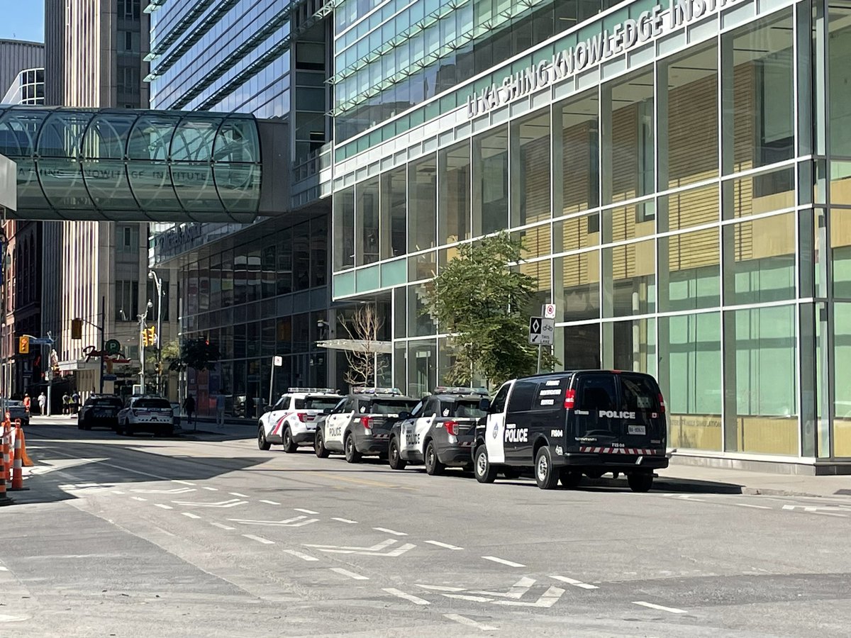 seven <a href="/TPSOperations/">Toronto Police Operations</a> vehicles in the bike lane here on Shuter at, both today and yesterday. any explanation as to why TPS is making cycling less safe? 

(one left as I was taking these hence why only six in the second photo)