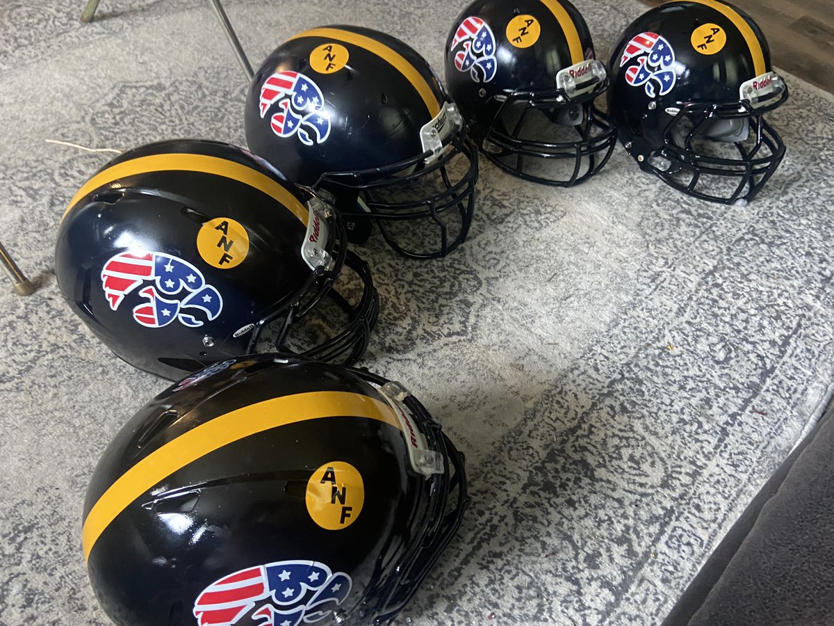 A quintet of Iowa Stars and Tripes helmets