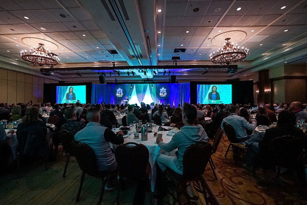 BILDAlberta's tweet photo. Today, we proudly welcomed Premier @ABDanielleSmith to the #BeyondtheBILD conference. Her commitment to engaging in dialogue on housing, land development, & affordability will ensure together, we can find innovative solutions to address the challenges Alberta is facing. #abBUILT https://t.co/ylkFQ7Zhy1