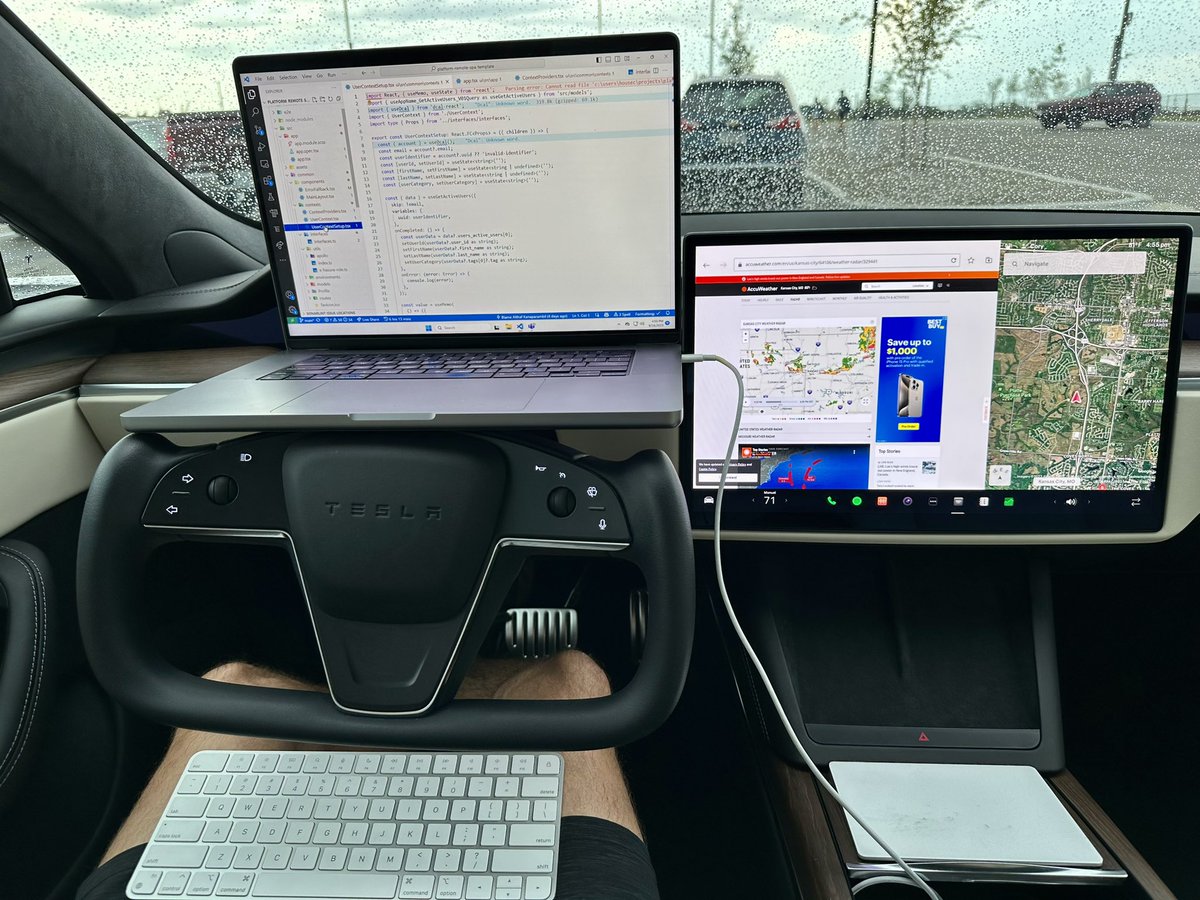 housecor's tweet image. An EV is the ultimate mobile office. 

It’s quiet.
I’m playing soft music. 
The A/C and cooled seat is on. 
My laptop and phone are charging. 
My screen is at eye level. It sits nicely on the yoke!
My seat is comfortable.
My trackpad is on the center console.
My keyboard is on my…