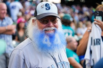Photo of a Mariners fan with the number 44 dyed into his beard. 