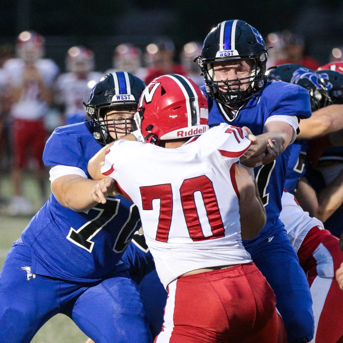 OshkoshWestFB's tweet photo. Varsity battling @FbNeenah on Teacher Appreciation Night. #TheEDGE #4Fors https://t.co/pjtfTF6Rda
