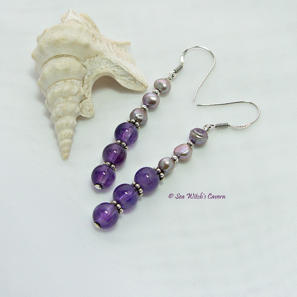 Beautiful Amethyst and pearl earrings. Amethyst is the birthstone for February so the earrings would be a lovely gift for a lady born in that month.  
etsy.me/2iAnwFU 
#Birthstonejewellery
#MHHSBD