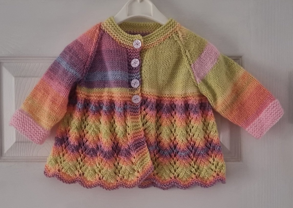 This is my new favourite a classic cardigan but looks really chic with the blended colours of orange, purple, pink and yellow. #Autumn #babycardigan #babygirl #folksy 
Linktr.ee/poppyknitwear