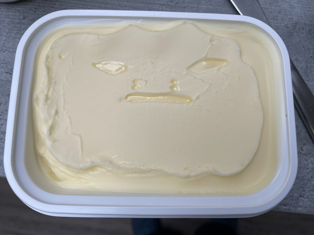 mrsbeard80's tweet photo. Dear @Lurpak on opening my new butter this morning I found this face staring back at me. Please advise?! Is this butter possessed? https://t.co/vLDsNCXSzd