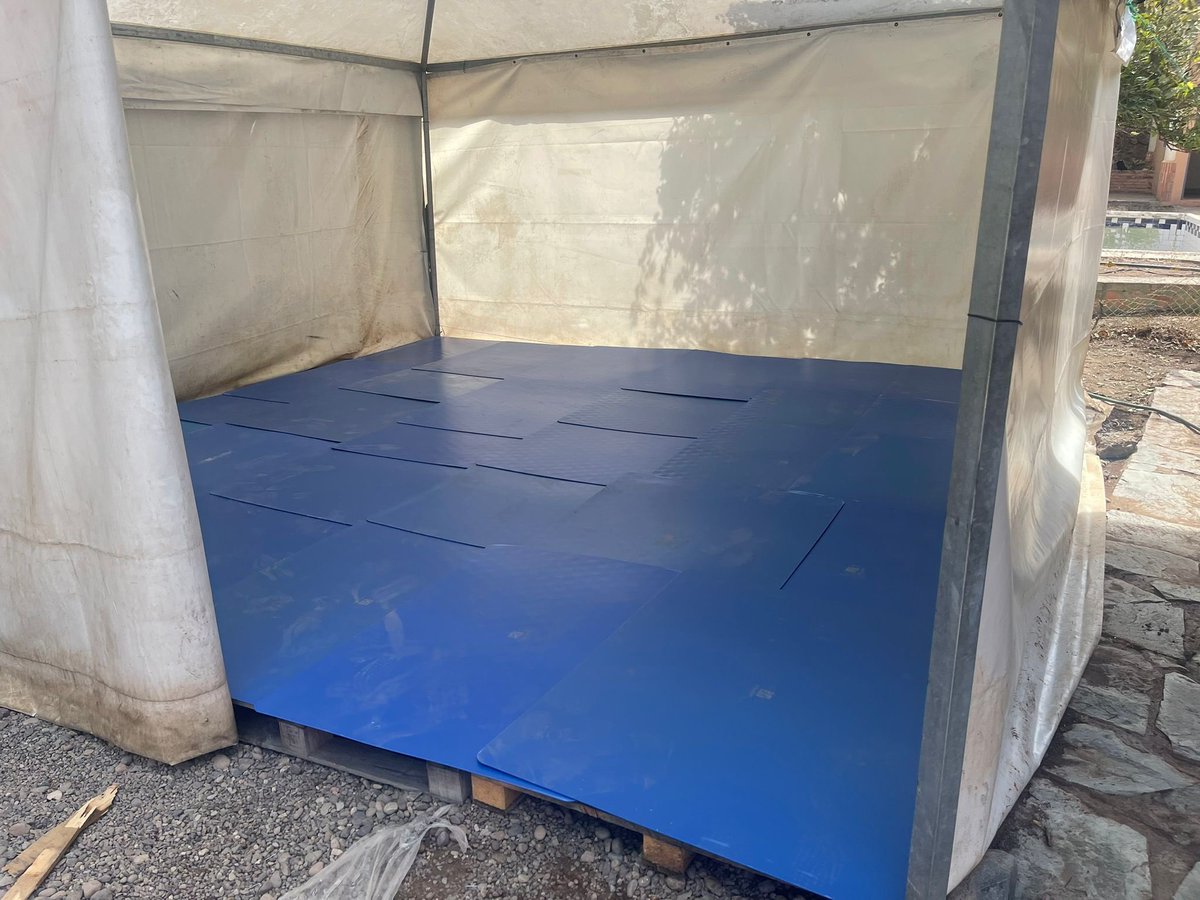 CCDawah's tweet photo. Today we’re assisting with the relocation of the association 
“The Development of Women &amp; Children in the Countryside”
who have been displaced due to the earthquake. This location will be used for a school, we’re preparing the flooring to make them waterproof Inshā’Allāh. https://t.co/0imSLFRMEW