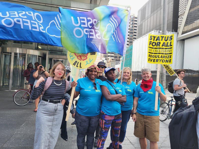 OPSEU's tweet image. Migrants are workers too! They deserve the same rights and protections as all other workers in Canada! The threat of deportation = higher risk of exploitation.
@JustinTrudeau listen to the thousands who took to the streets today - it’s time for #StatusForAll! 

@MigrantRightsCA