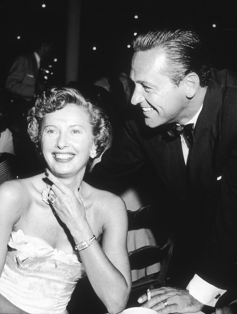 Barbara Stanwyck and William Holden during a party held at the Ambassador Hotel in Hollywood, 1951 Photo by Murray Garrett