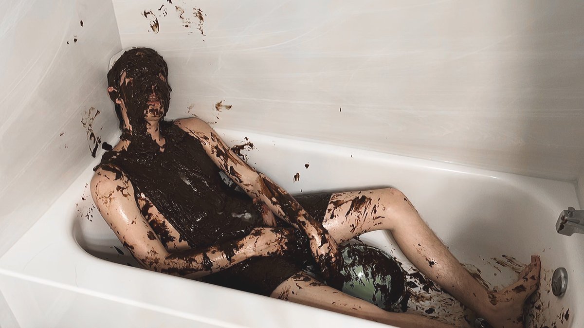 enjoying some chocolate pudding