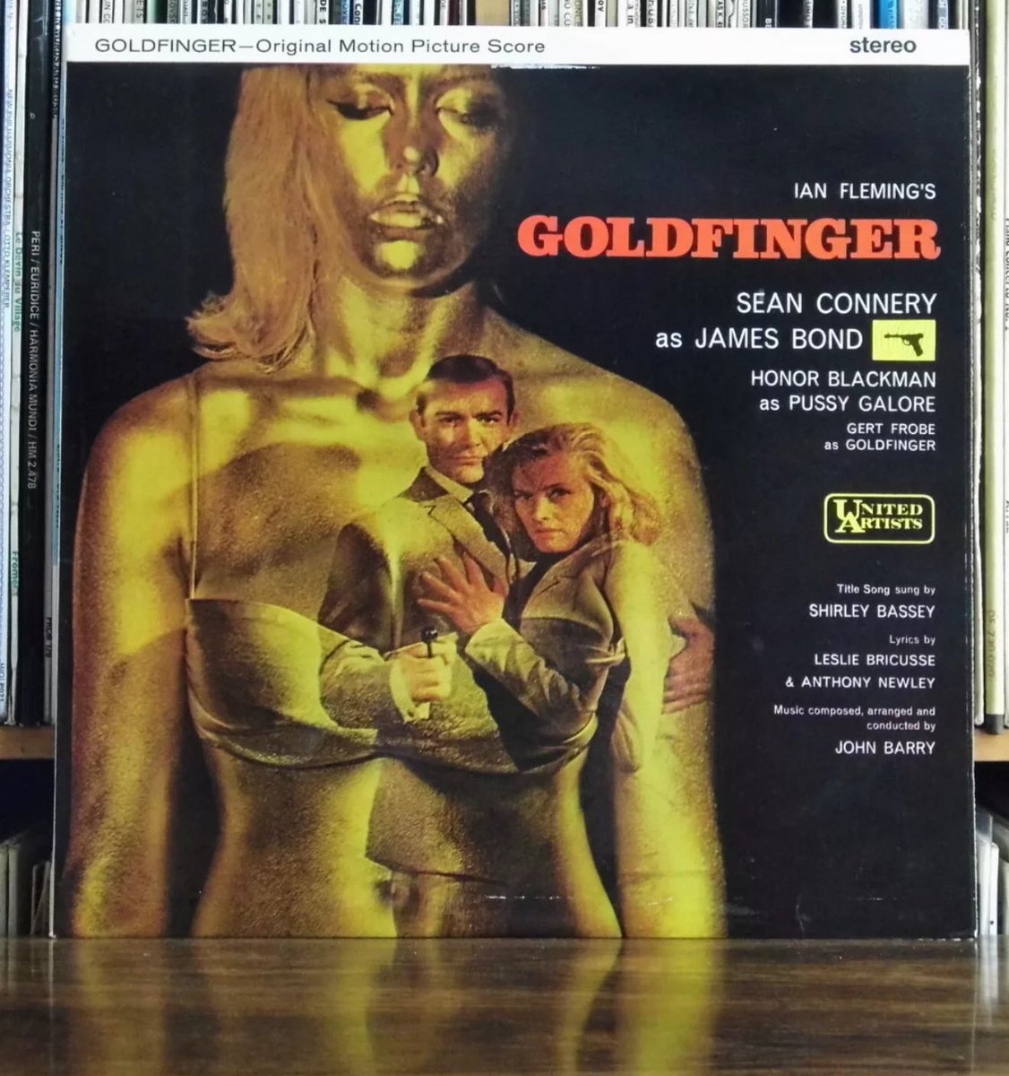 SteJWi22's tweet photo. OTD in 1964, the gala premiere of #Goldfinger took place. 
It marked the 1st. film role for 21 yr old #MargaretNolan launching a career that spanned many films.
She was the face of the film on posters, merch &amp; in the title sequence. The small role of ‘Dink’ was part of the deal. https://t.co/dxkBKH9ugl