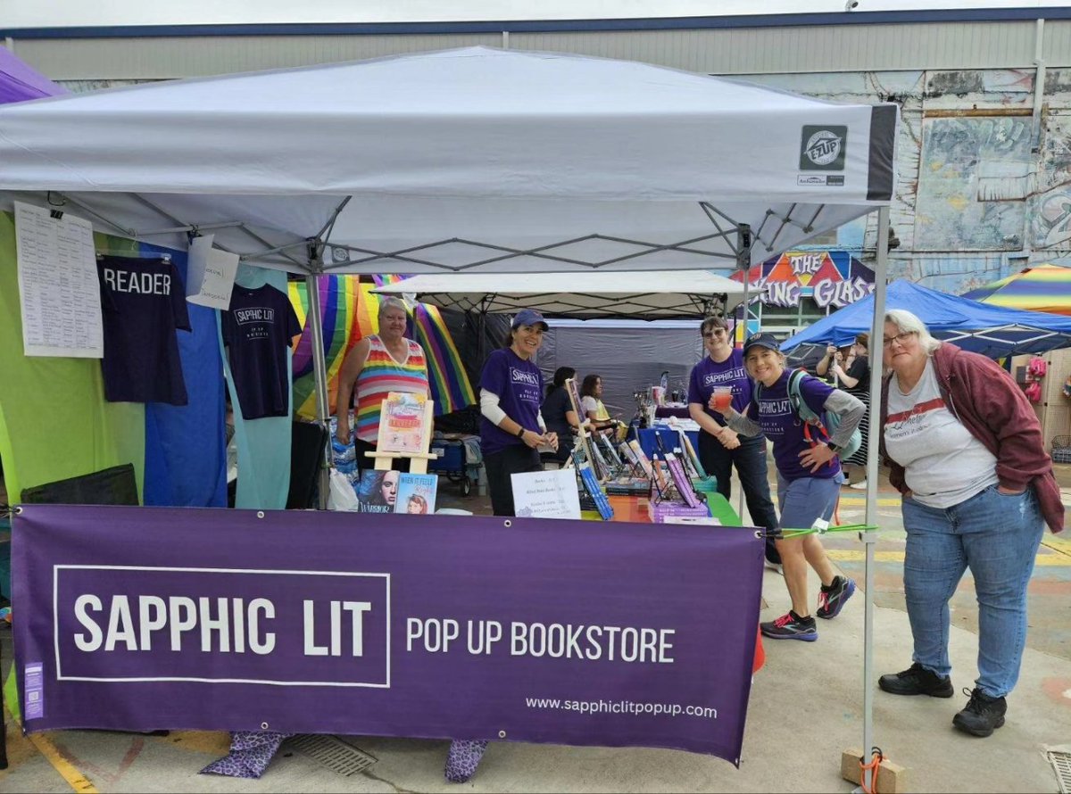 We are open for business at #charlottesvillepride! Stop by our booth to meet some of our authors and buy some books! #sapphiclit #pride
