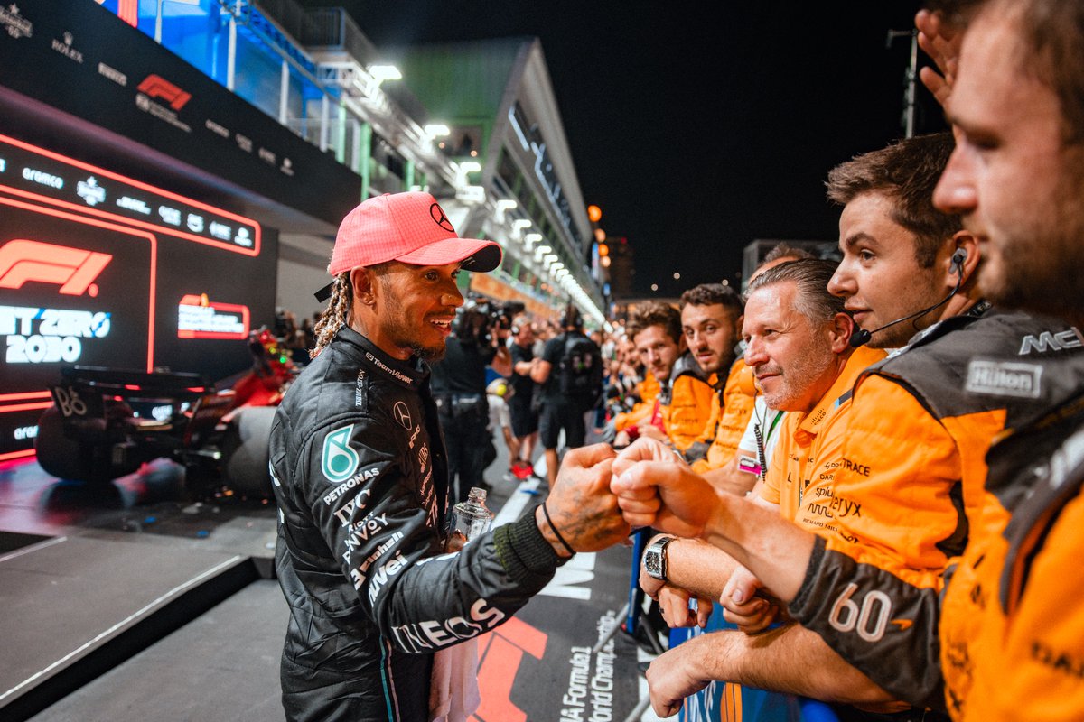 McLarenF1's tweet photo. Always part of the McLaren family. 🧡

It was fun racing out there, Carlos and Lewis! 🤝

#SingaporeGP 🇸🇬 https://t.co/qx7Vz99DY0