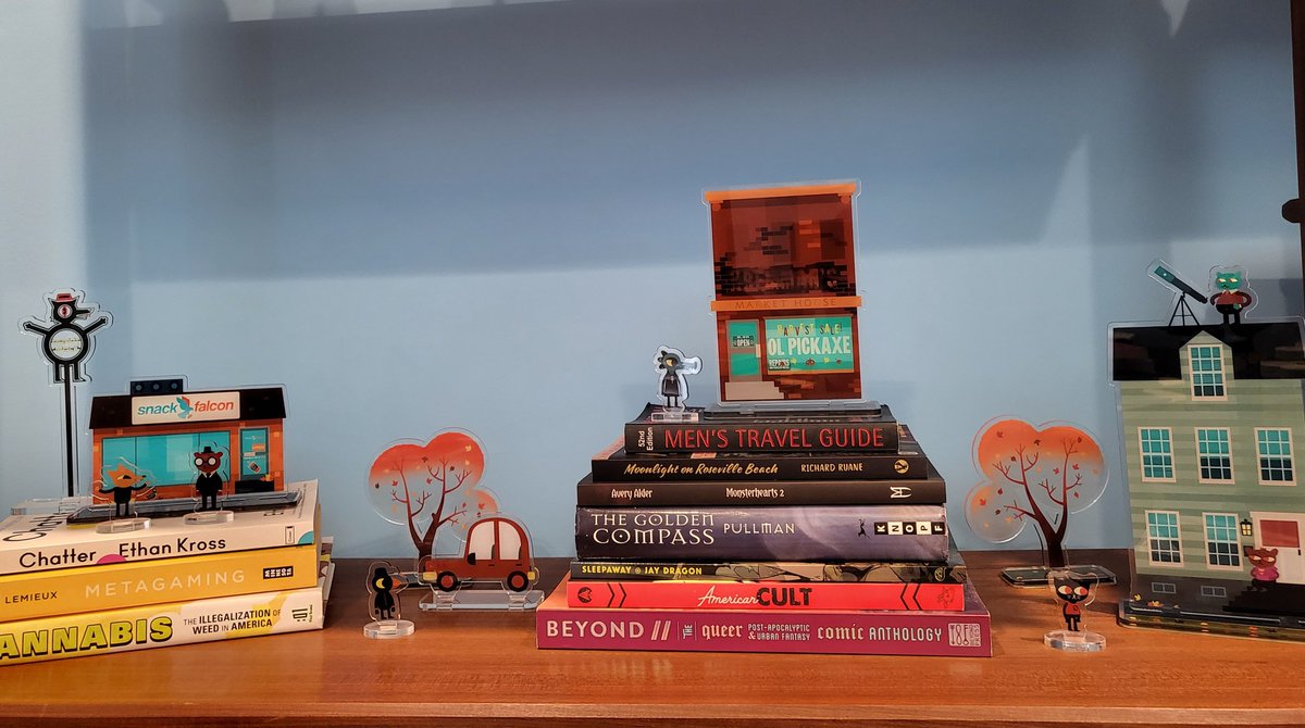 It felt wrong not to have hills in Possum Springs, so I picked out some relevant books for displaying my awesome @NightInTheWoods standees from @LimitedRunGames @FinjiCo @bombsfall