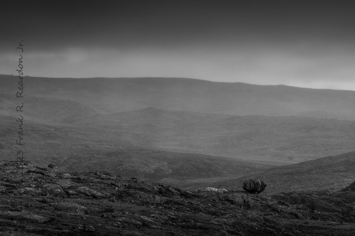 FrankReardon1's tweet photo. A view looking over the #ArcticTundra with some #snow coming down and a #GlacialErratic #BaffinIsland #Nunavut #Blackandwhite SEP.17.2023 https://t.co/y7YeftBxhZ