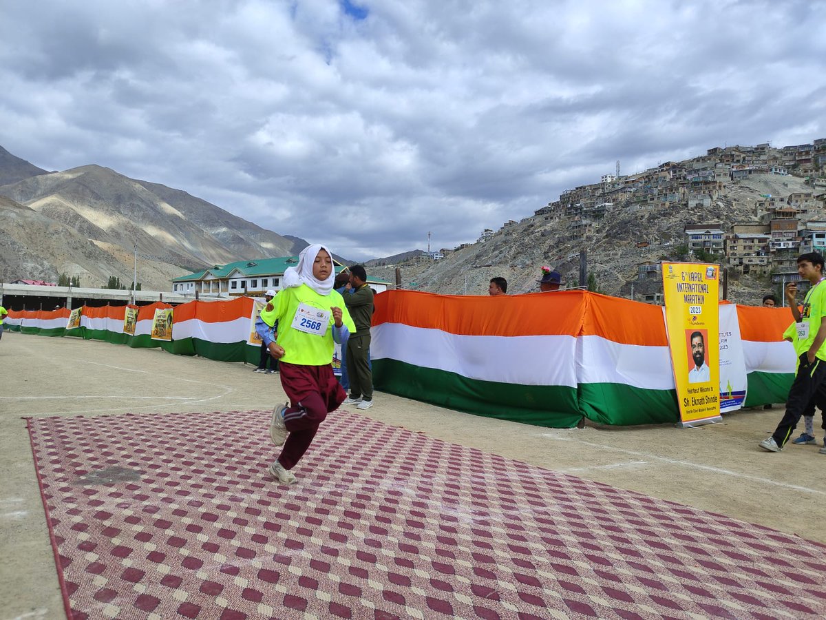 DIPR_Kargil's tweet photo. Runners of 2 km girls category return back to the finish line at the Khree Sultan Choo Sports Stadium in Biamathang, Kargil.
#KargilInternationalMarathon2023 
#Runforhunderman https://t.co/TqkYY6O5Fx