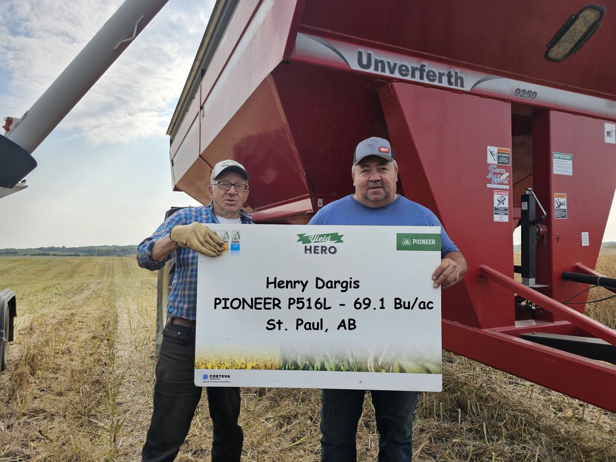 An oustanding yield of #P516L canola for Henry Dargis...keeping his Dad Simon busy with the cart!  This hybrid is hitting the prairies with a bang! #YieldHero23 <a href="/PioneerSeedsCA/">Pioneer Seeds Canada</a>