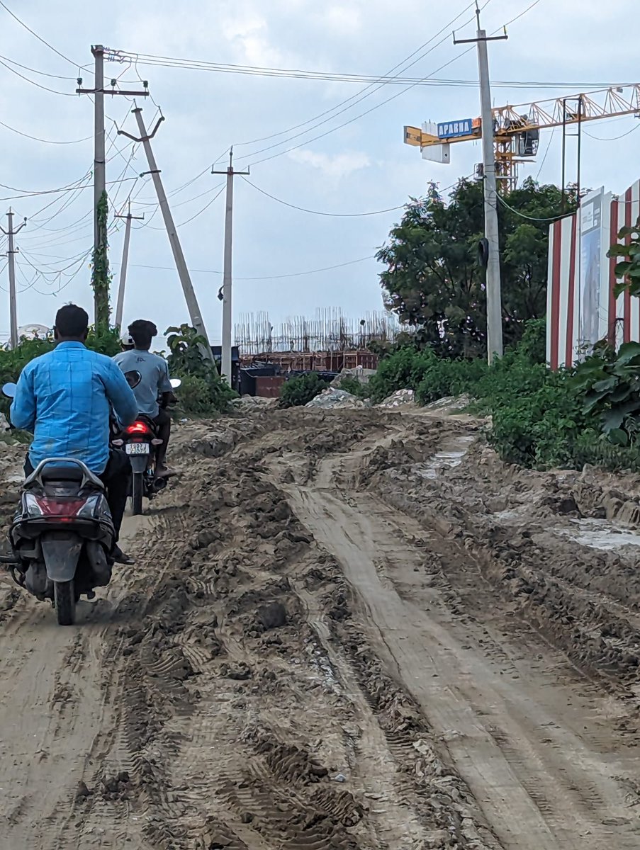 dhasmana's tweet photo. @nitunarula @AparnaGroup @mctellapur @GMRMLAPTC @TRSGMR It's a nightmare to commute on this road especially during rains. Look at the sludge. https://t.co/T3e8K7SnrL